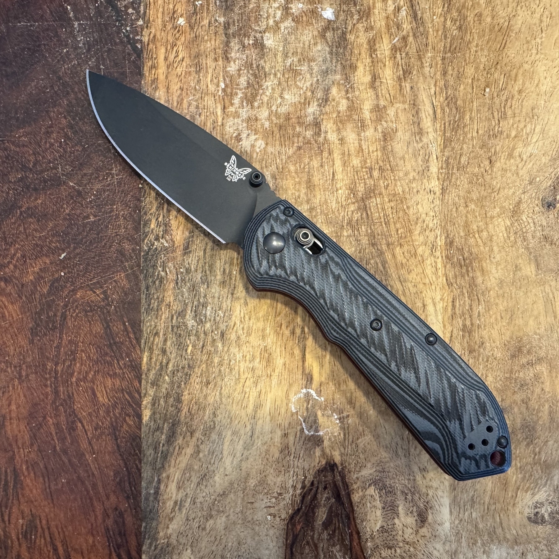 Benchmade Freek on wooden surface